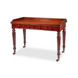 An early Victorian mahogany side table in the manner of Holland & Sons