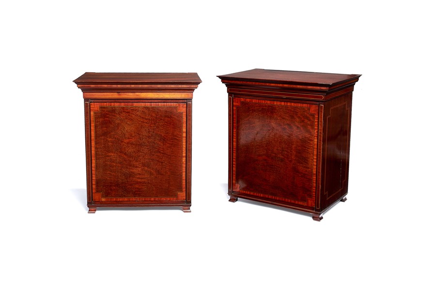 A pair of figured mahogany and satinwood crossbanded revolving cutlery boxes