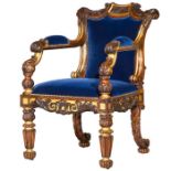 A George IV rosewood and parcel gilt carved armchair attributed to Gillows