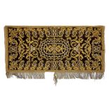 An 18th century gold thread embroidered black velvet altar cloth