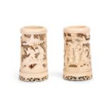 A pair of early 20th century Chinese ivory filigree carved brush pots