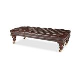 A 19th century mahogany leather upholstered ottoman long stool