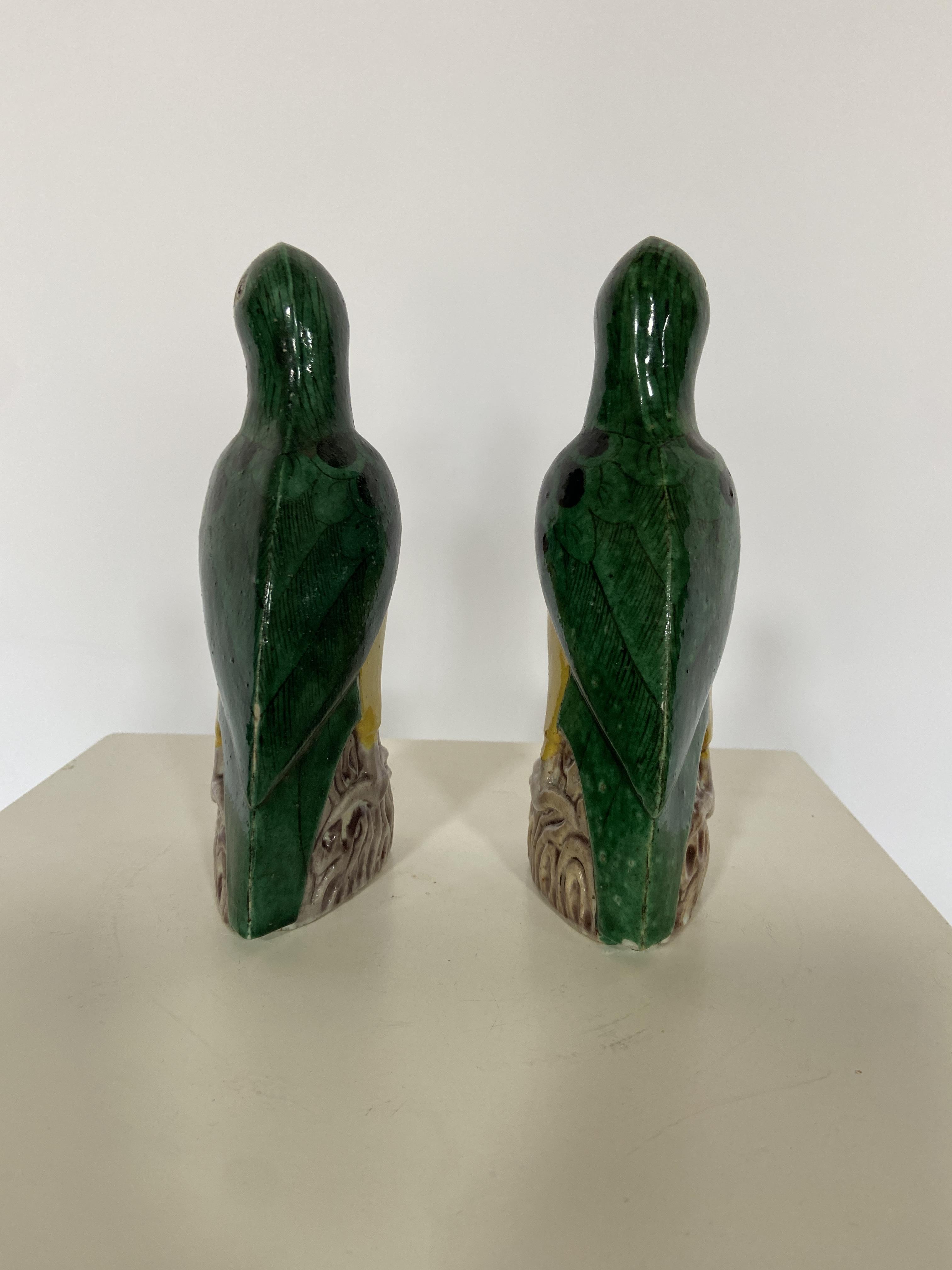 A pair of Chinese- Export green and yellow glazed pottery parrots - Image 2 of 4