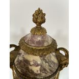 A pair of late 19th century Louis XVI style brêche violette and gilt bronze urns