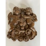 A small carved oak plaque, German, circa 1700