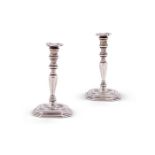 A pair of 18th century Dutch silver toy candlesticks by van Geffen