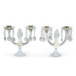A pair of George IV cut-glass lustre twin-light candelabra