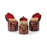 A set of three George III mahogany serpentine knife boxes