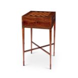 An unusual Regency rosewood and tulipwood banded games / writing / work table