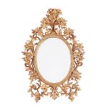 A late 19th century Florentine carved gilt wood mirror