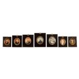 Seven 19th century portrait miniatures in ebonised frames