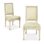 A pair of Louis XVI cream and gilt chaises by Jean-Baptiste Lelarge