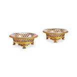 A pair of late 19th century cut-glass sweetmeat dishes on gilt bronze stands