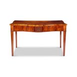 A George III mahogany serpentine serving table