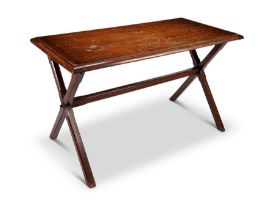 An early 20th century oak tavern table