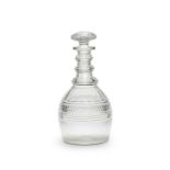 A late 19th century Regency style hob-nail cut glass magnum decanter