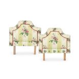 A pair of floral upholstered single bed heads