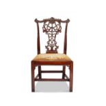 A 19th century Chippendale style carved mahogany dining chair