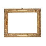 An 18th century carved giltwood rectangular picture frame