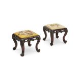 A pair of 19th century carved mahogany rococo revival stools