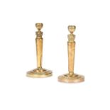 A pair of 19th century French Empire ormolu candlesticks