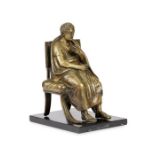 A late 19th century polished bronze figure of a seated Roman Emperor