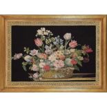 A large floral machine made tapestry in a plain moulded gilt frame