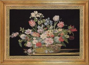 A large floral machine made tapestry in a plain moulded gilt frame