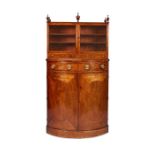 An unusual late George III mahogany and tulipwood banded bowfront side cabinet