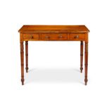 A Regency satinwood and mahogany side table