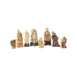 A group of eight late 19th century Chinese carved soapstone figures