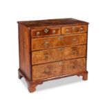 A Queen Anne walnut and featherbanded chest