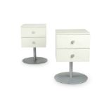 A pair of Aram ‘Cubo’ white laminate revolving bedside tables