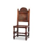 A Charles II oak solid seat chair, Lancashire