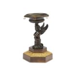 A Regency patinated bronze ring stand