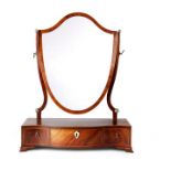 A George III mahogany and rosewood crossbanded serpentine dressing mirror