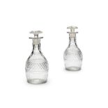 A pair of Regency Irish half size hob-nail cut glass decanters, probably Cork