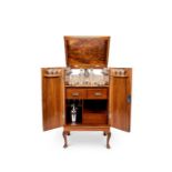 A 1930's Queen Anne style burr walnut and crossbanded cocktail cabinet