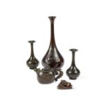 A group of five late 19th century Oriental bronze objects