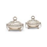 A pair of George IV silver covered vegetable dishes by Sebastian Crespel (II), London, 1822