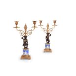 A pair of Regency gilt bronze jasper ware twin-light candelabra