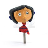 Lot # 54: CORALINE - First-Ever Prototype Coraline Jones (Dakota Fanning) Puppet Built for the Film