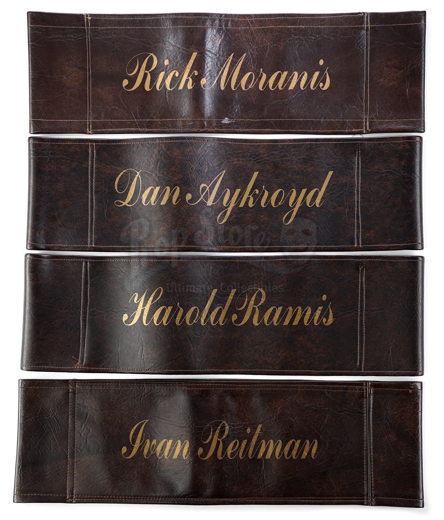 Lot # 693: GHOSTBUSTERS II - Dan Aykroyd, Rick Moranis, Harold Ramis, and Ivan Reitman's Chairbacks