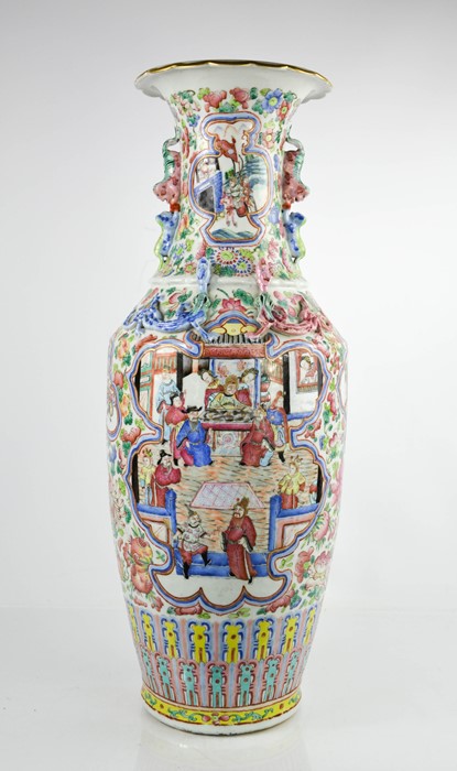 A large Chinese famille rose vase, with raised dragons to the shoulders, enamelled with butterflies,