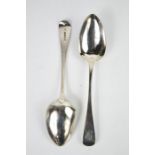 A pair of Georgian silver serving spoons, engraved with initial to the handle, London 1821, 3.