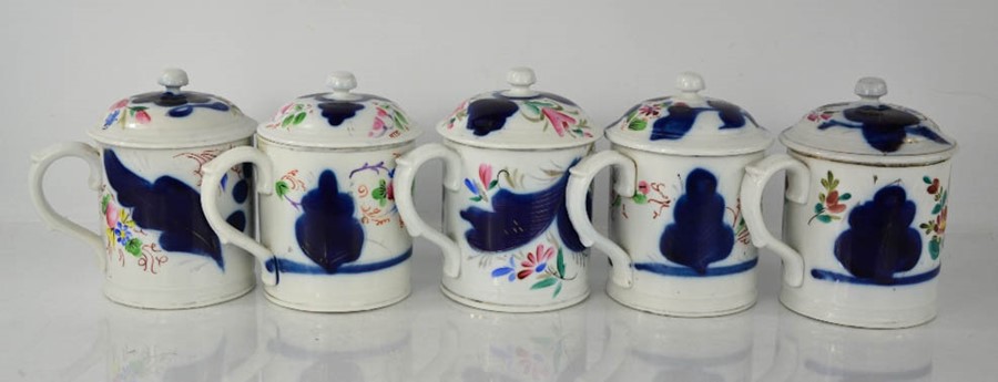 A group of five 19th century Russian chocolate pots with covers, marked to the bases with maker;