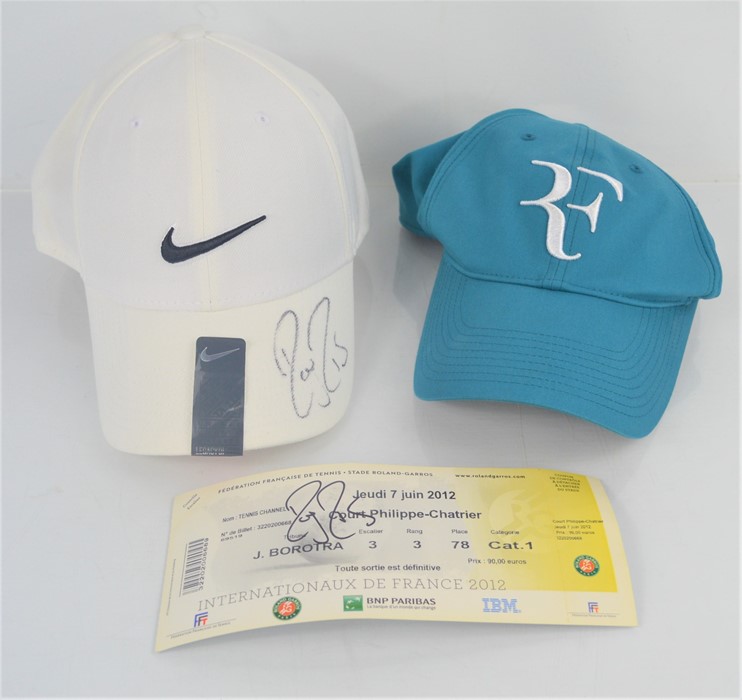 A Roger Federer hand signed cap together with a signed Internationaux De France 2012 ticket