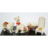 Four examples of Crest-ware, to include Carlton Morecambe Cheshire Cat, Swan China cat, Archadian