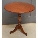 A mahogany occasional tilt-top table, with tripod base.