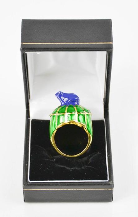 A blue and green enamelled dress ring, with a frog form finial, size M, 14.35g.